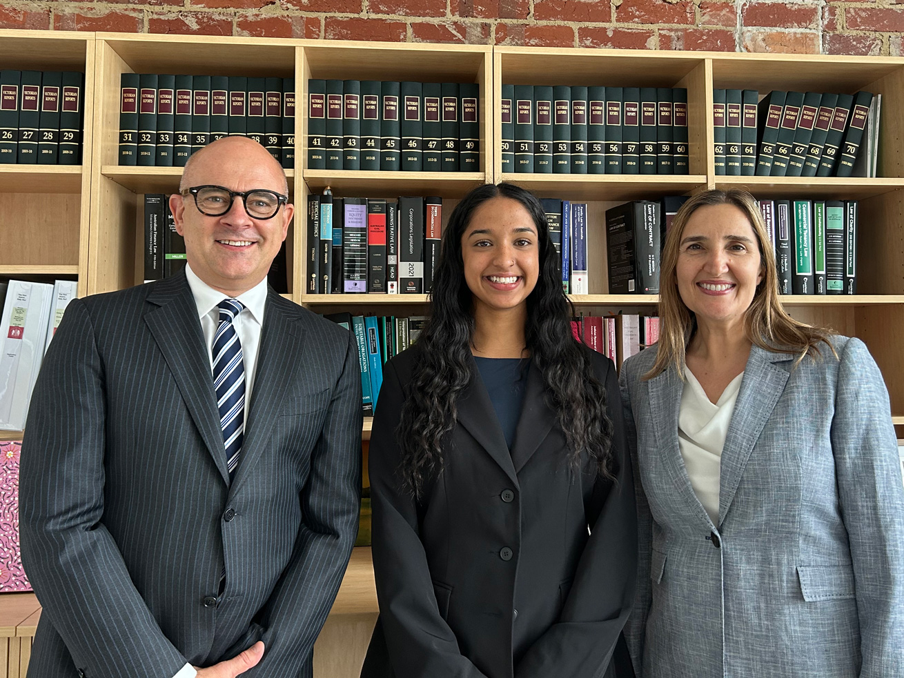 Pictured left to right: Associate Justice Ian Irving, Thivika Srikanthan, Associate Justice Mary-Jane Ierodiaconou.